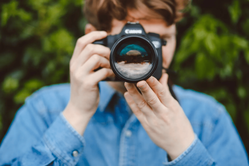 man holding a camera 