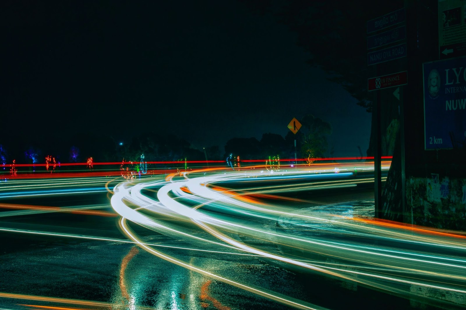 Low Light Photography long exposure image of car lights on the street